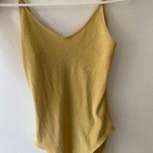 Yellow bodysuit